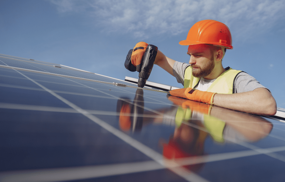 Man Installing Solar Panels - Specialist Accounting Solutions