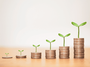 Savings allowance like coins growing aligned with plants
